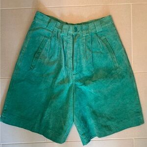 Long/ high waisted green/blue leather shorts.